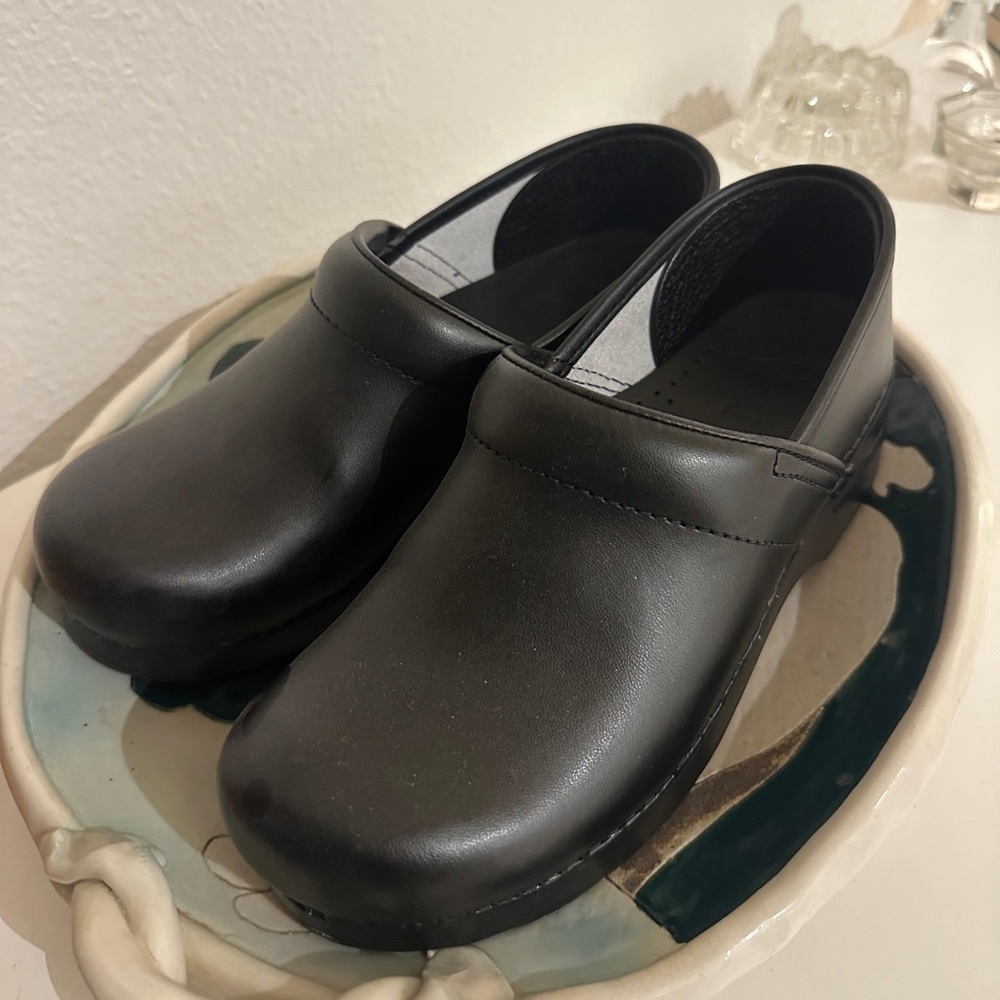 Never Worn Dansko Clogs